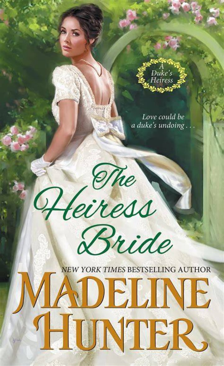All-white: The heiress bride, 27, was the epitome of elegance in her all-white long-sleeved dress while clutching a bouquet of white flowers near the chuppah, in which the couple wed in a Jewish ceremony